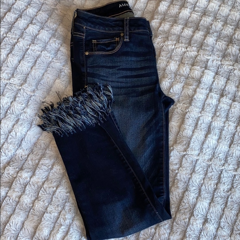 AE skinny fringe jeans